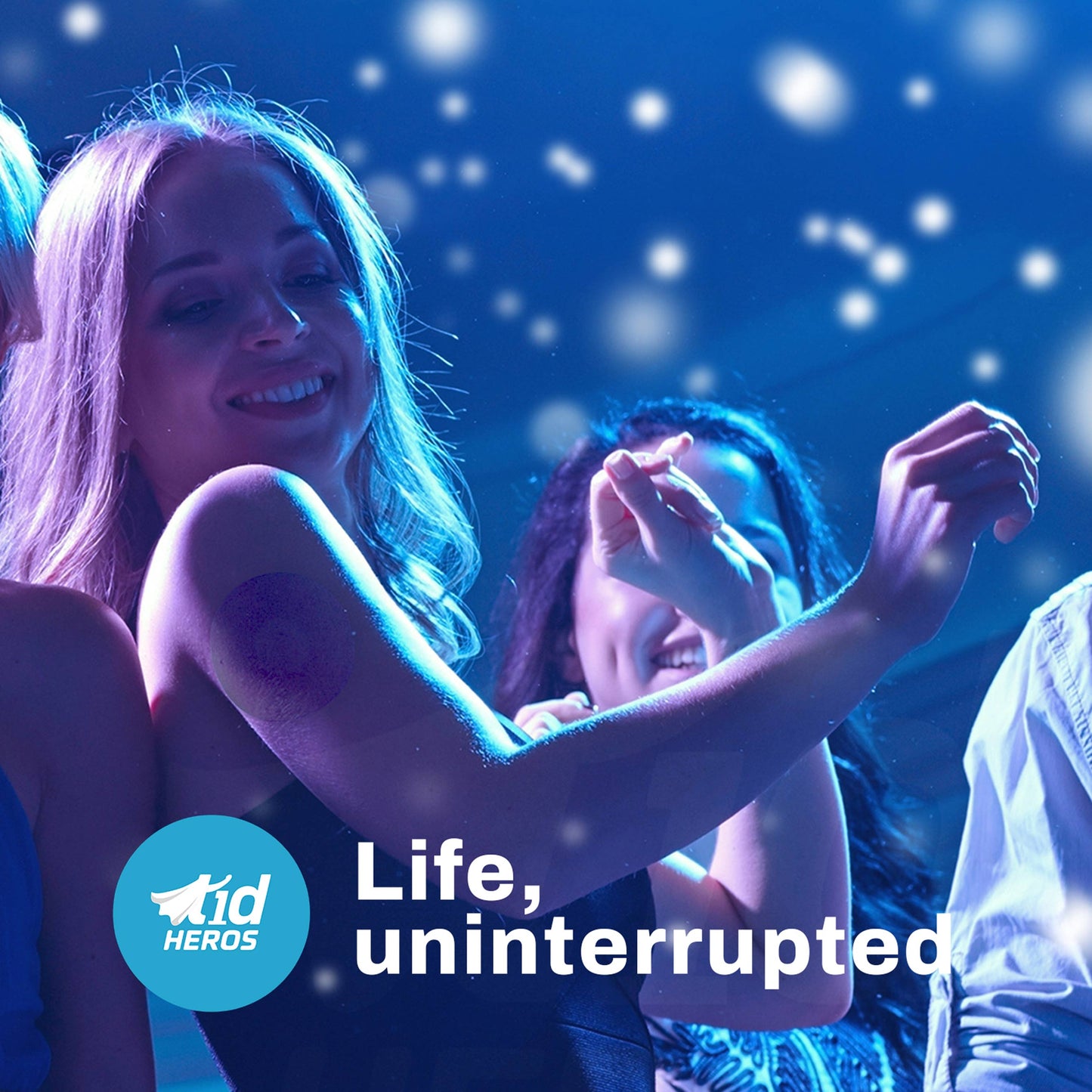People dancing with T1dHEROS logo and text 'Life, uninterrupted' on a blue background.