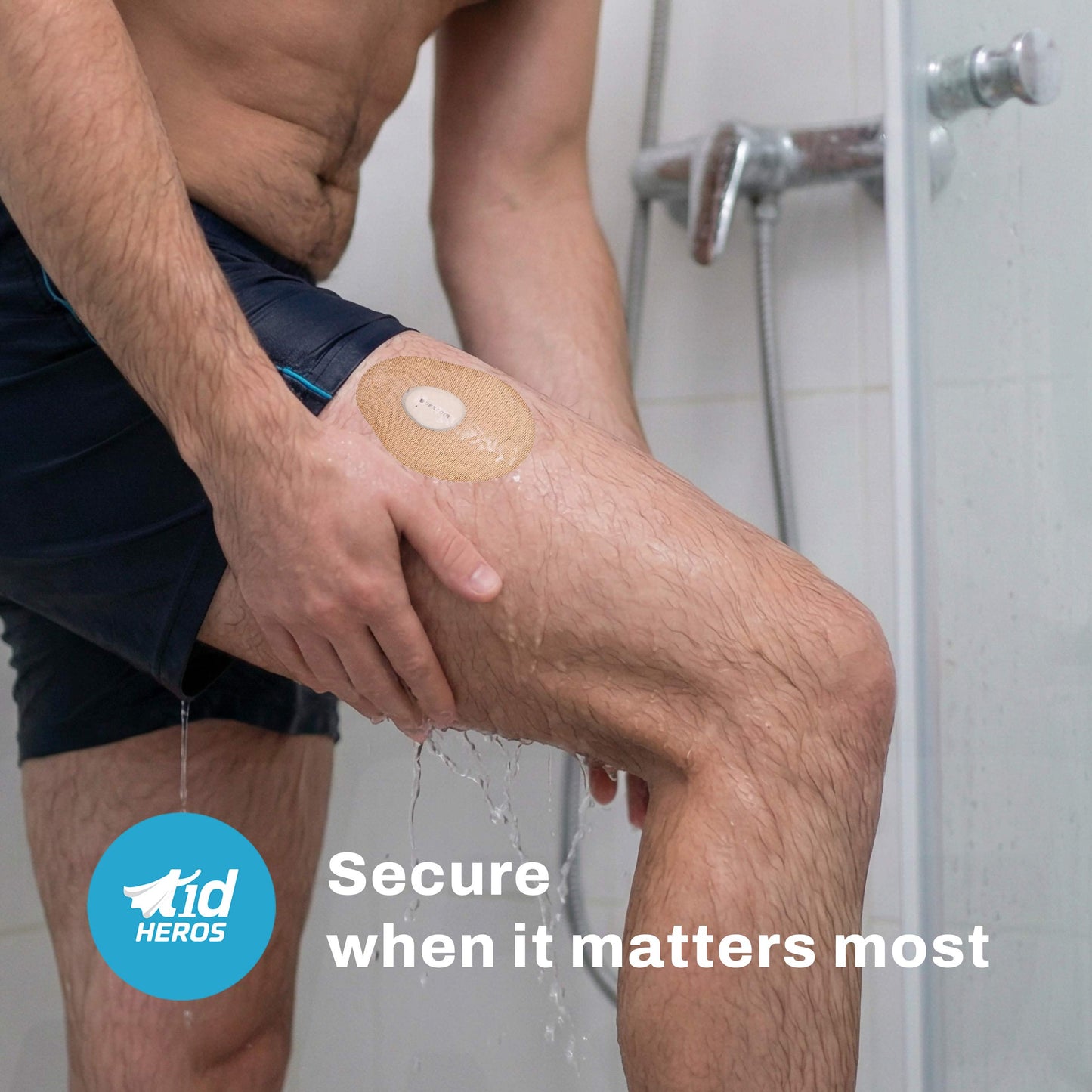 Person applying a bandage to their knee in a bathroom setting with TidHEROS branding.