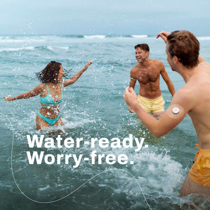 Three people playing in the ocean with text 'Water-ready. Worry-free.'